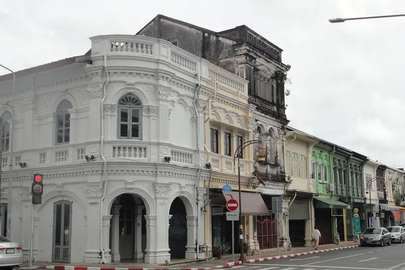 Pastel Sino-Portuguese shophouses along a street in Phuket Old Town