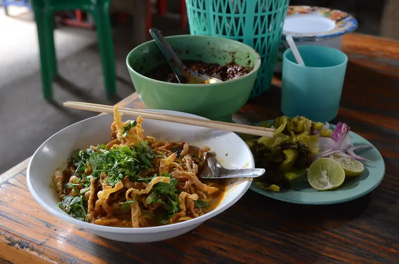 A bowl of khao soi, northern Thai curry noodle soup