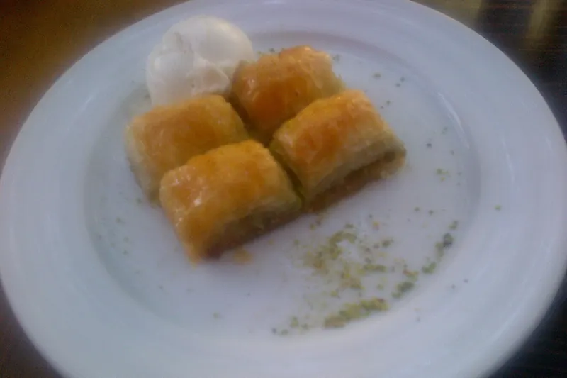 Pistachio baklava served with ice cream