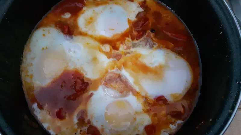 Menemen — eggs cooked slowly with tomato and green pepper