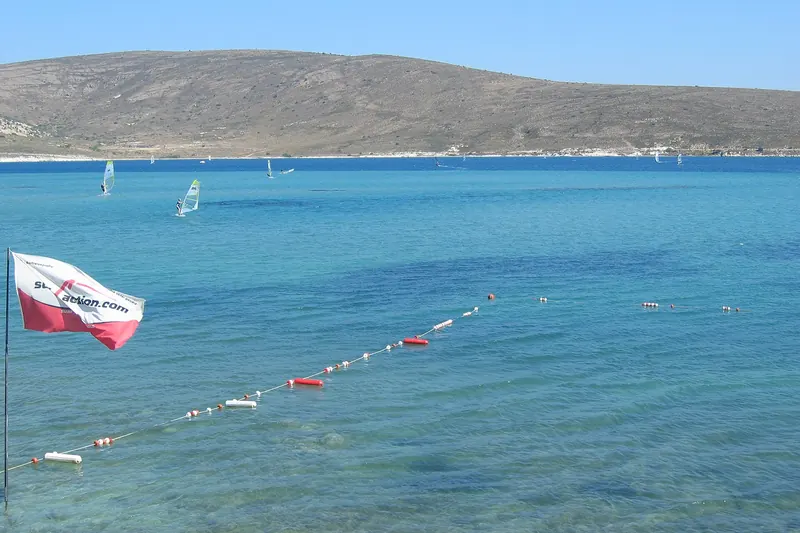A windsurfer on the Aegean under the summer meltem