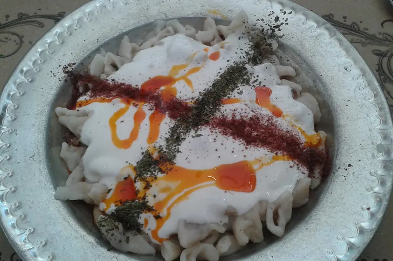 Mantı — small lamb dumplings under garlic yoghurt