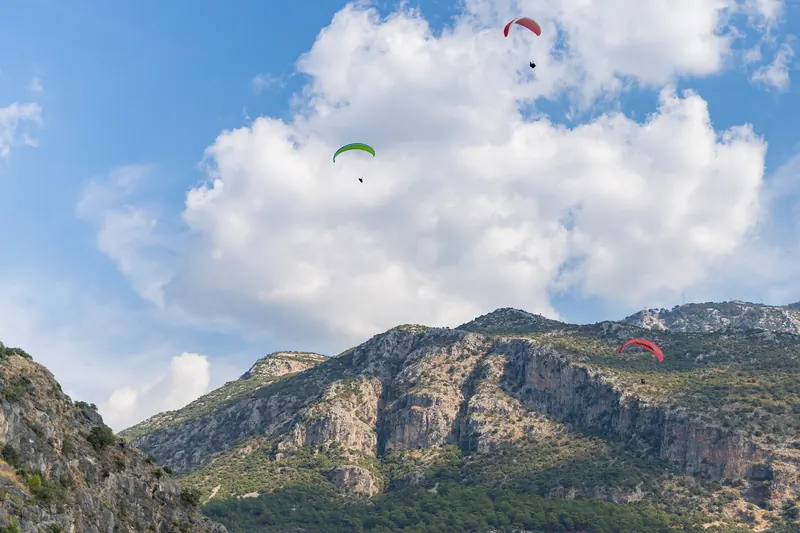 A paraglider launching from Babadağ above Ölüdeniz