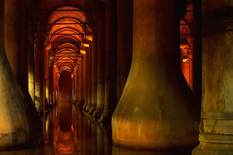 Lit columns receding into the Basilica Cistern