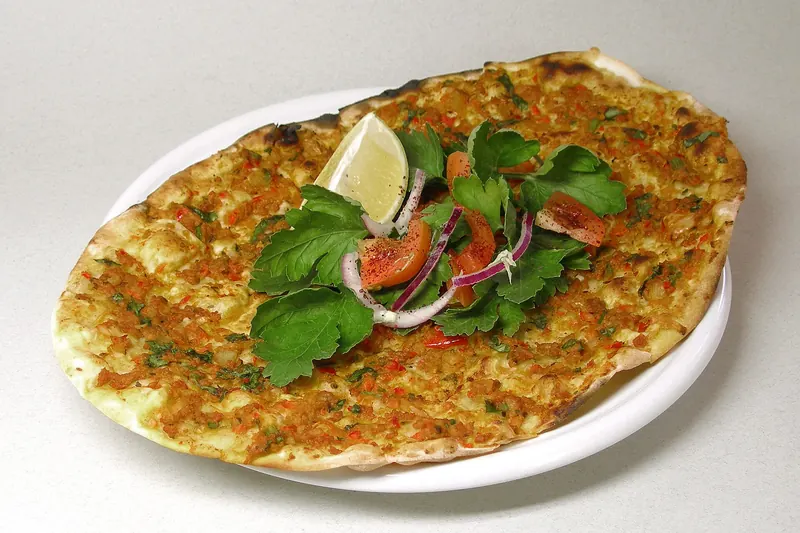Lahmacun, thin bread baked with minced lamb and pepper