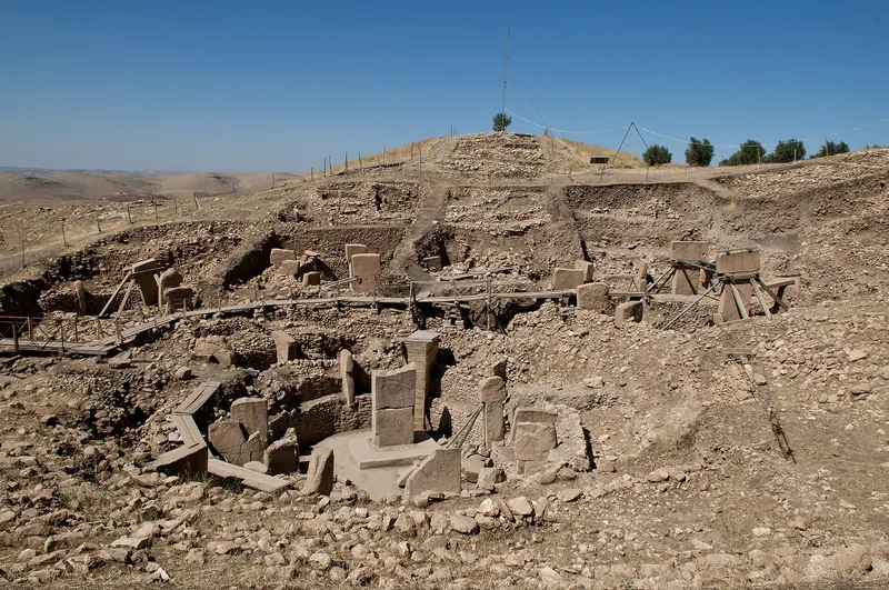Excavated circular enclosures with carved T-shaped limestone pillars at Göbekli Tepe near Şanlıurfa