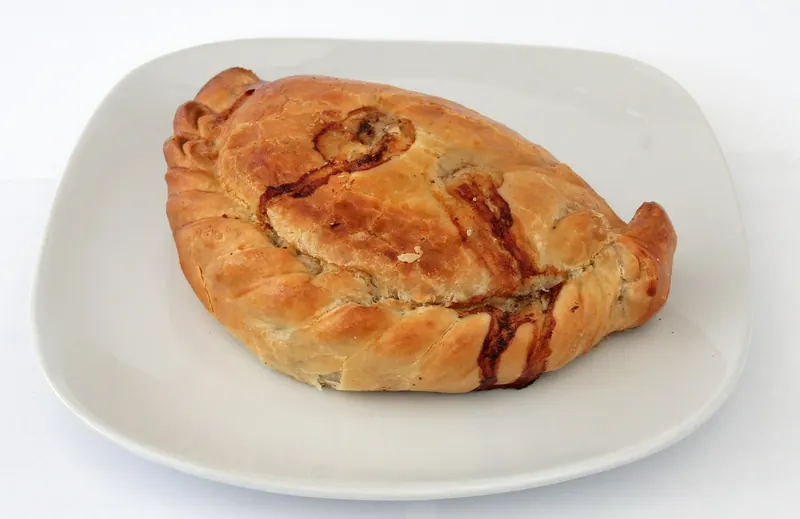 A traditional Cornish pasty, crimped along one edge
