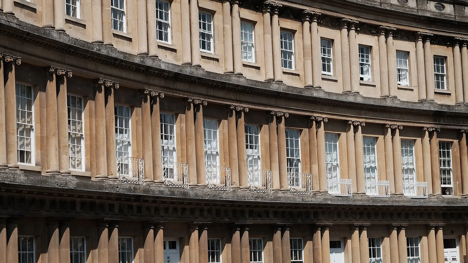 Georgian townhouses curving around the Circus in Bath