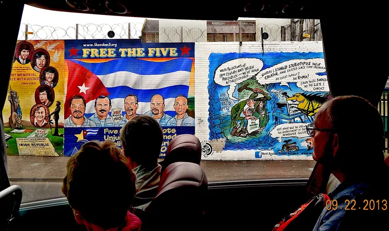 Large-scale political murals along Belfast's International Wall