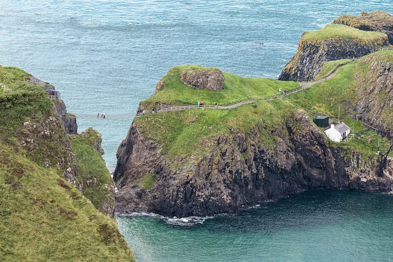 The Carrick-a-Rede rope bridge suspended above the sea