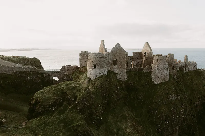 The ruins of Dunluce Castle perched on its cliff edge