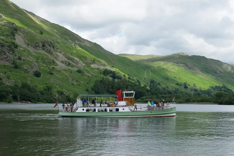 The vintage steamer Western Belle crossing Ullswater
