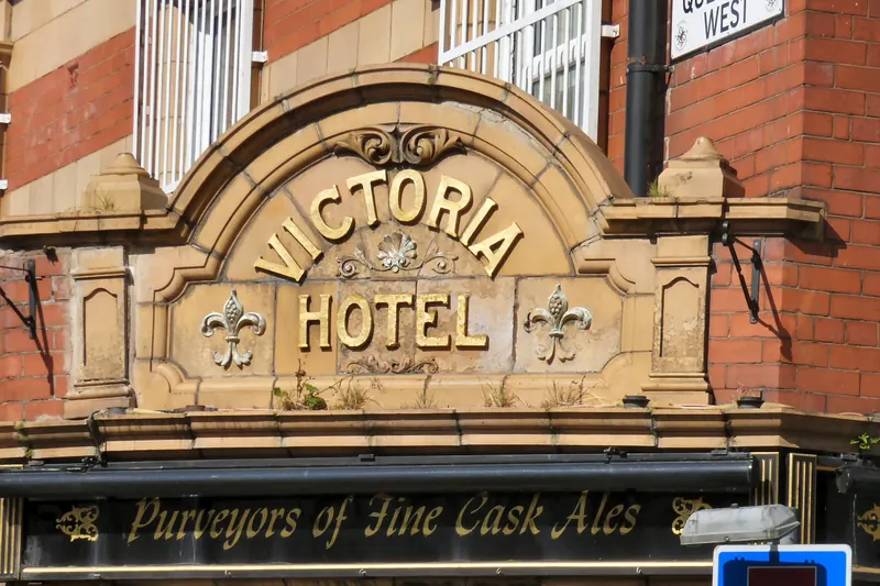 A traditional pub sign advertising fine cask ales