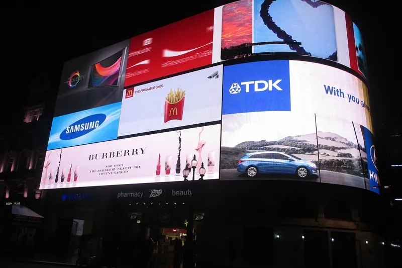 The illuminated advertising lights of Piccadilly Circus at night