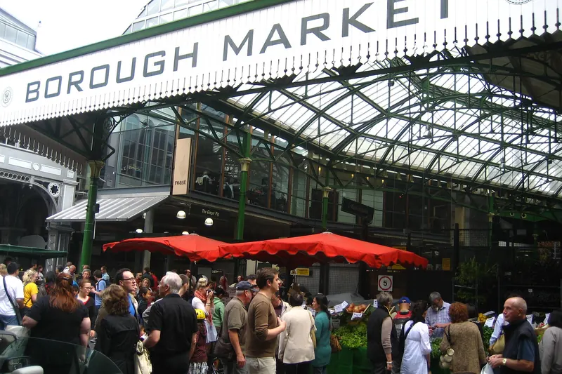 Food stalls under the covered roof of Borough Market