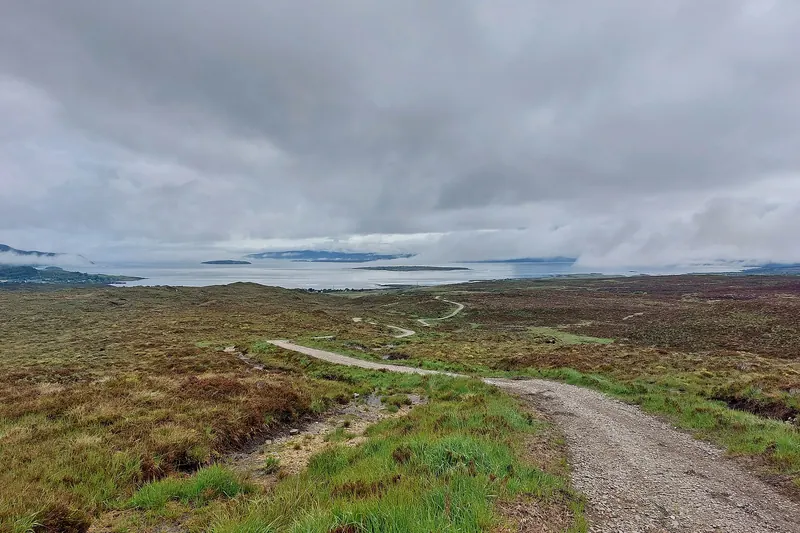 A hiking trail crossing open moorland on the Isle of Skye