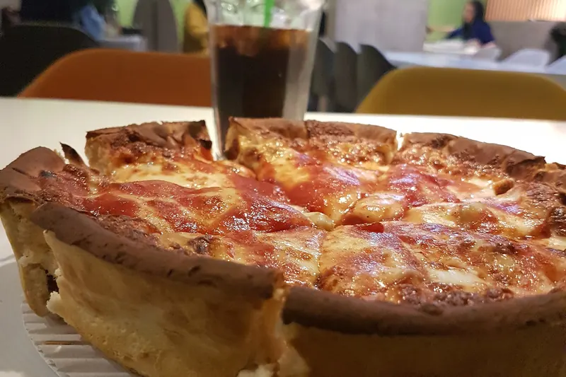 A slice of Chicago deep-dish pizza