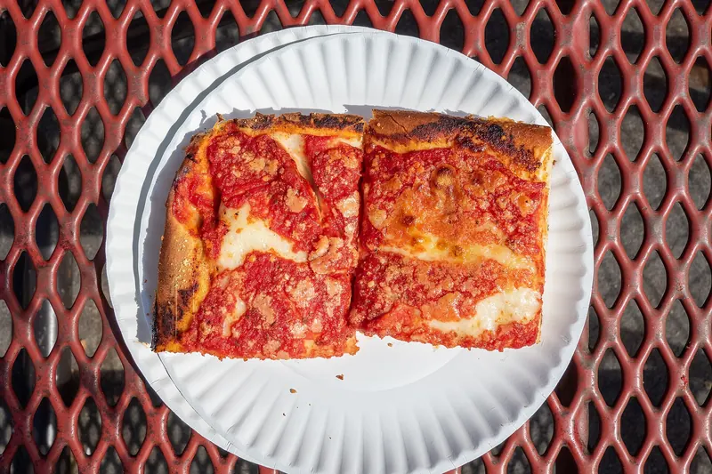 A wide slice of New York pizza