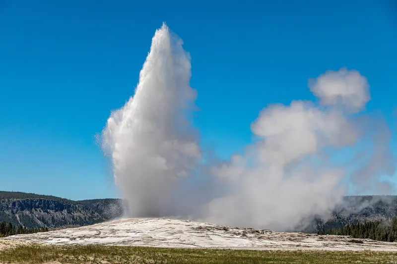 Old Faithful erupting in the Upper Geyser Basin