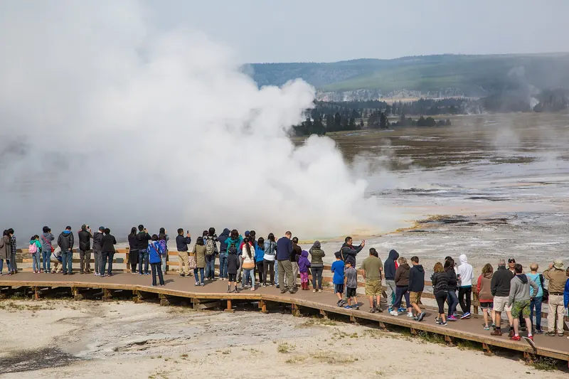 A boardwalk crossing a Yellowstone geyser basin