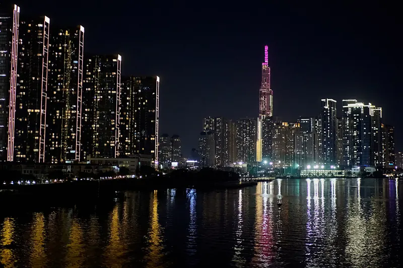 The skyline of Ho Chi Minh City with high-rise towers beside the Saigon River