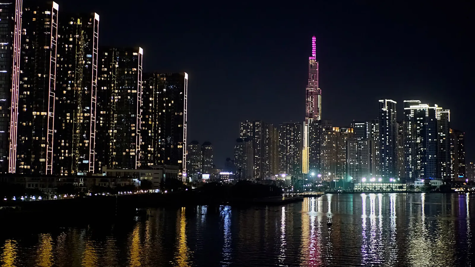 The skyline of Ho Chi Minh City with high-rise towers beside the Saigon River