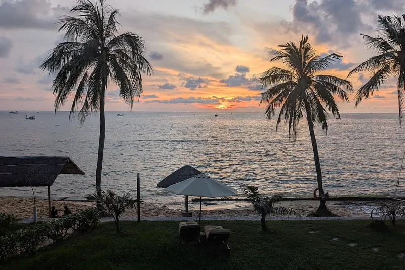 The sun setting over the sea at a beach on Phu Quoc island